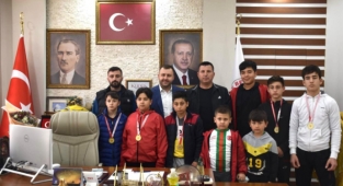 Başkan Yüksel'den sporculara tebrik